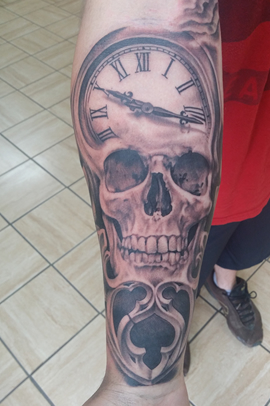 Skull Clock Tattoo done by Mark Brettrager